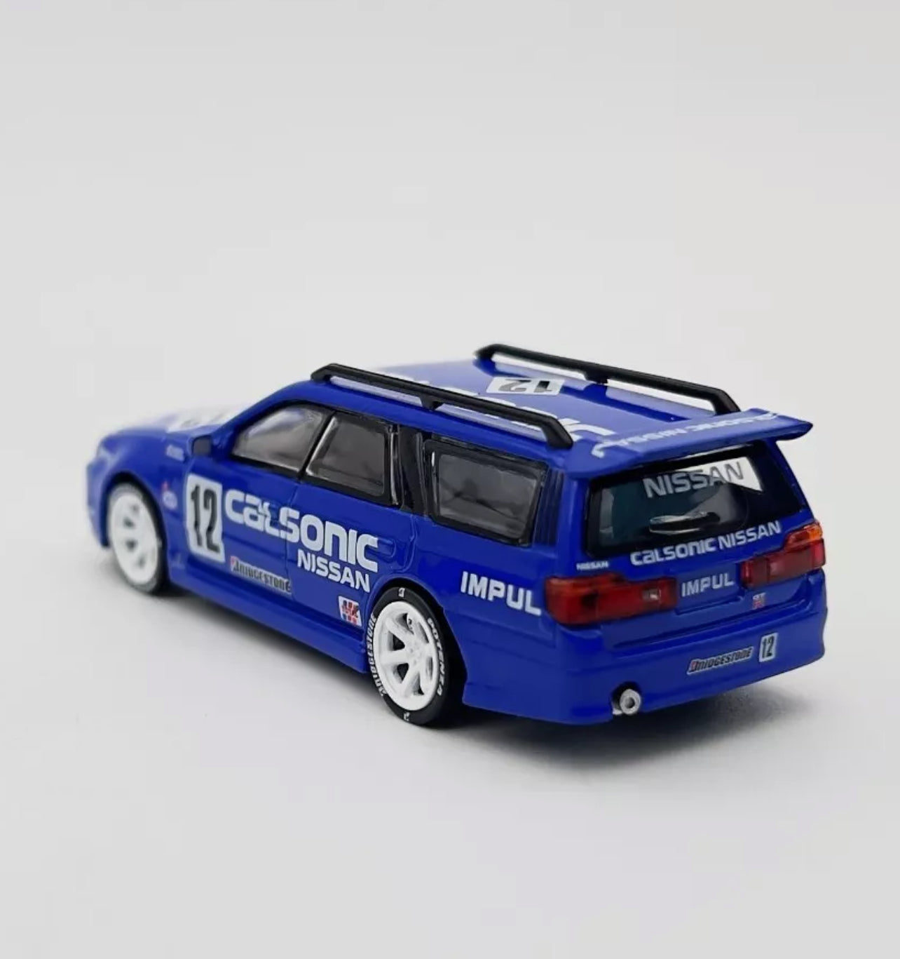 Pop Race 1:64 Nissan Stagea R34 Wagon Calsonic #12 Blue PR64-59