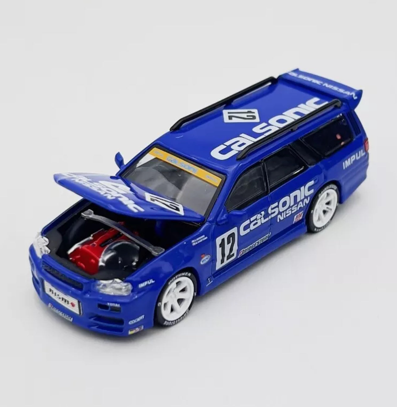 Pop Race 1:64 Nissan Stagea R34 Wagon Calsonic #12 Blue PR64-59