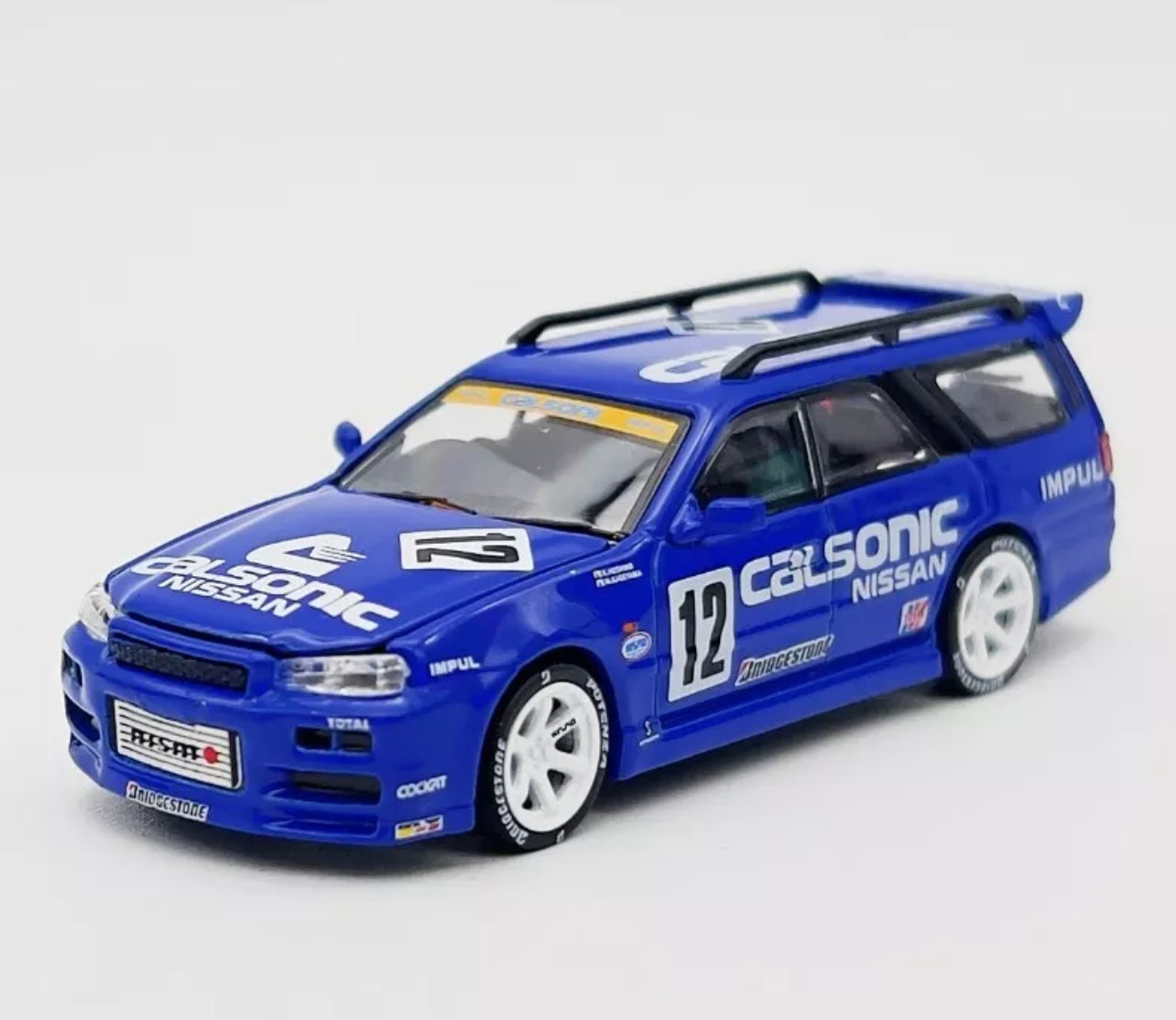 Pop Race 1:64 Nissan Stagea R34 Wagon Calsonic #12 Blue PR64-59